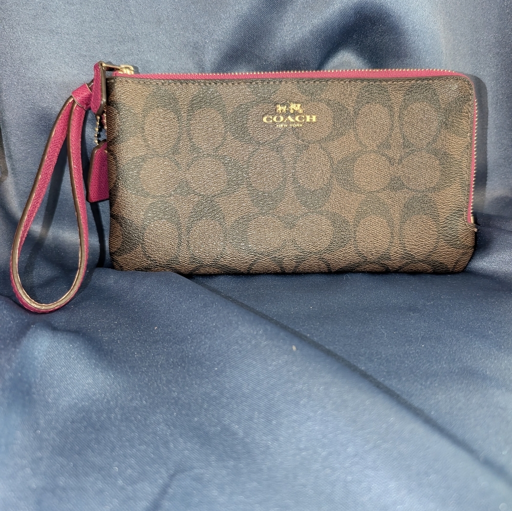 COACH Brown Signature Wristlet with Pink Trim and Strap